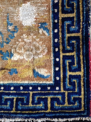 late 18th century ningxia square with 5 peonies. some spots of wear but still very attractiv and with beautiful wool and colors.           