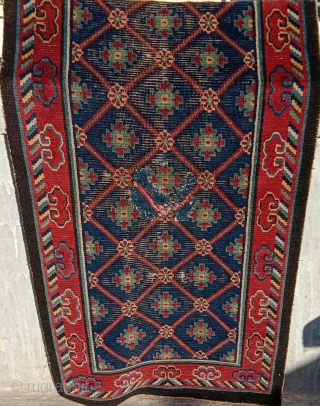 Tibet .  19 century collector piece khaden with fabulous saturated colors, top wool and a rare design.. home made old restoration in the center..can be redone if you cannot live with  ...