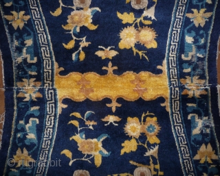 finely woven with top quality wool chinese ningxia under saddle. 4 lion-dogs medaillon design rarely seen on saddle rugs.  mid 18th century, 140x 67cm.        