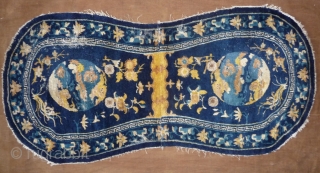 finely woven with top quality wool chinese ningxia under saddle. 4 lion-dogs medaillon design rarely seen on saddle rugs.  mid 18th century, 140x 67cm.        