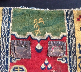 it is not only that it has a fantastic green center field but for many reasons this is a very special tibetan saddle rug. i had for many years only one half  ...