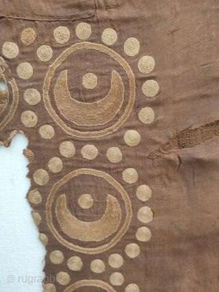 central asian chain stiched bow cover fragment, southern east turkestan, southern silk road area depicting an ancient central Asian cultures moon and sun design. for a related example please see the "cotsen  ...