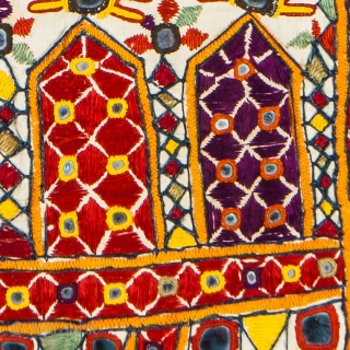 Dharaniyo (Cover for a stack of quilts)
SIZE: 42” x 33”
AGE: 60-80 years old approx.
FROM: Gujarat
NOTE: Detailed embroidery and mirror work highlight this well crafted textile. A border of mashru surrounds the silk  ...
