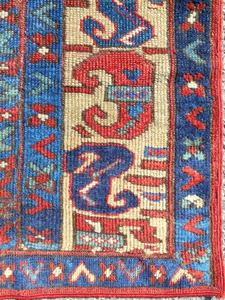 Early 19th c. SaujBulagh rug fragment composed of assembled borders. Cool!                      