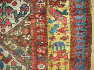 Full pile Persian Kurdish long rug. Playfull drawing with a very cool border. Exceptional color.  Circa 1870.               