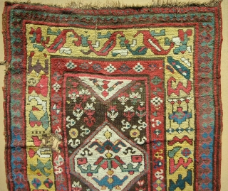 Full pile Persian Kurdish long rug. Playfull drawing with a very cool border. Exceptional color.  Circa 1870.               