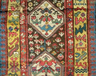 Full pile Persian Kurdish long rug. Playfull drawing with a very cool border. Exceptional color.  Circa 1870.               