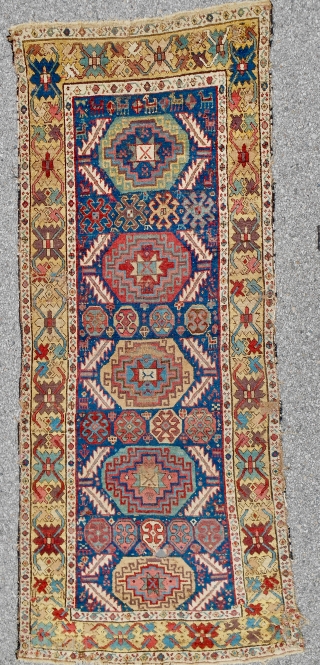 C. 1820-40 NWP Kurdish rug with a Memling gul and serrated leaf design. (39” x 95”) Mostly decent pile. 14 distinct colors including an old aubergine and true camel wool. Original kilim  ...
