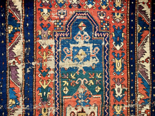 Early Kazak Fachralo prayer rug. Circa 1850. Extraordinary shimmering color. Good pile with some moth damage. Just professionally washed. Pristine! Email: patrickpouler@gmail.com