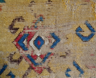 Extraordinarily rare 17-18th c. Central Anatolian rug fragment. Mounted on yellow linen. About 3.5 x 5.5ft.                 