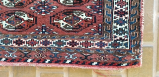 Turkmen Chuval.
Complete with back and remnants of ties.
Yomud??
Good pile on front and the piled band on the back.
Minor wear on red back.
47 inches long by 27 inches wide.
     