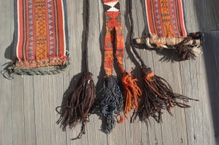 Camel Trappings.
Saudi Arabia, Al Hasa, Hofuf.
Both in excellent condition.
Large band is 100 inches long by 7 inches wide with leather wrapped wood end pieces.
Smaller band with elaborate tassels  is plain flat  ...
