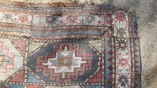 Kazak fragment with Memling guls. As found, dirty, moth-eaten and miserable. Seems to be a cut and shut piece of a larger rug. Thick loose weave and floppy handle.

Fabulous colours though.

120cm x  ...