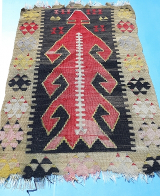 Zippy Kilim.

Fragmentary Turkish item of highly distinctive design and curious material. Wefts and warps are both of lustrous natural yarn which looks and burns like silk. Wacky colour palette to go with  ...