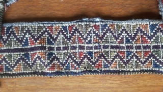 Unusual Moroccan Middle Atlas bags. Beni M'Guild, mid-century, complete. Mainly wool with cotton decoration, spangles and tassels A couple metallic. Pile-woven straps with Berber knots        