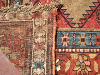 Bakhshayesh long rug, 8' 2" X 3' 3", later 19th century, wool on wool. Heavy wear to foundation limited to central area; sides have good even pile; middle field has low even  ...