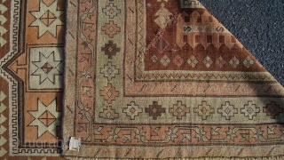 Caucasian Kazak (exact provenance unknown to me, opinions invited). Earlier 20th century, 6' 4" X 3' 6", uncommon earth tone colors and pleasing design. No significant oxidization, scattered small holes, otherwise even  ...