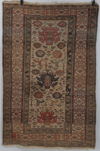 Unique design elements in this Caucasian piece (Shirvan?). 6' 0" x 4' 1" Overall good condition with some re-piling done, scattered minor, mostly oxidized wear; still very serviceable rug with lots of  ...