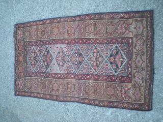 Old Kurdish rug, very good condition overall with medium even pile, no repairs, excepting machine overcast selvage. Weaver's personal touch of abrash between medallions. Early 1900's, size 6' 8" x 3' 8"  ...