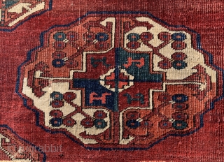 Early  possibly 18th century, S Group main Salor carpet fragment.
In addition to early border drawing, the piece has a lovely
violet patina and unusual drawing for a main carpet.

Dimensions: 35" X 20"  ...