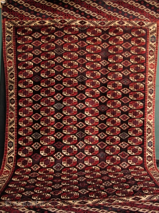 Chodor main carpet from the second quarter of the 19th
century with exceptional colors and a sublime abrash--
in excellent condition. (7'5" X 12'3")           