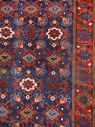 "Why should I be unhappy? Every parcel of my being is in full bloom." Rumi, 13th century, Baluch rug, Ferdows area, North-east Persia, 19th century. Wool on cotton with goat hair side  ...