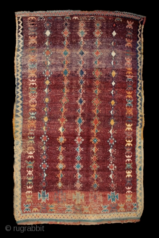 Moroccan 'Taznacht' rug, 138x235 cm, mid. 20th century. Floating rows of small medallions and stars on an aubergine field.... strong colors, strong village/tribal design. Freshly washed, floopy, clean, soft, ready o use.  ...