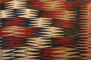 Veramin/Varamin Kilim, 110x224cm, end of the 19th century.
Beautiful vegetable dyed colors combined with natural light-brown coloured wool.
Wool on wool. Very archaic look, dazzling design, early type of Vermain kilims, real tribal piece.
Embroidered  ...