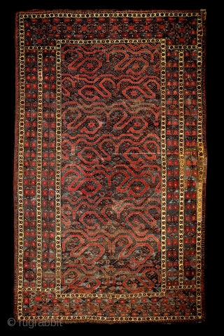 Mythic turkmen Beshir ‘snake/dragon/cloudband’ main carpet from the 19th century. 
Have you ever seen such a complex border system on that type? Dozens of scorpions (?) in border’s partly blue water. The  ...