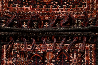 Bakhtiari saddle bag, 60x112cm, end of 19th century, Iran
Beautiful hand knotted ends with high pile.
Sewn together on the sides with finely spunned goat hair yarns. And all the black colors also made  ...