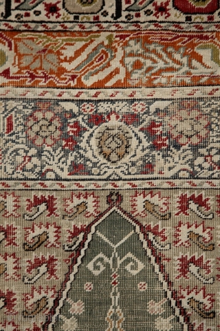 How to draw tension...  trembling borders with running flames and an empty green mihrab..... Ghiordes prayer rug, 172x125 cm, wool on cotton, ca 1900. More pieces: http://rugrabbit.com/profile/5160     