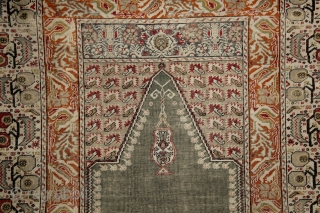 How to draw tension...  trembling borders with running flames and an empty green mihrab..... Ghiordes prayer rug, 172x125 cm, wool on cotton, ca 1900. More pieces: http://rugrabbit.com/profile/5160     