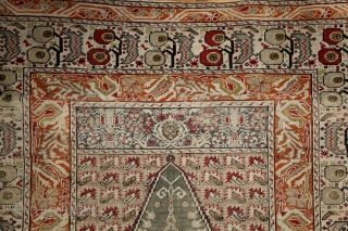 How to draw tension...  trembling borders with running flames and an empty green mihrab..... Ghiordes prayer rug, 172x125 cm, wool on cotton, ca 1900. More pieces: http://rugrabbit.com/profile/5160     