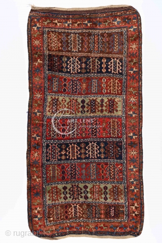 South-east anatolian, Kurdish/Yürük tribal rug with burning organic dyes and full pile of silky, shimemring wool Perfect/untouched condition with original finish-braids at both ends. Very unusual archaic design for the type, which  ...