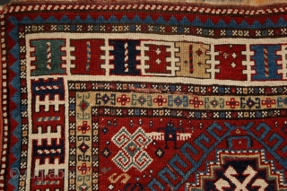 Rural, free & real. Charismatic village rug from the Caucasus. Somewhere in the Gazakh/Fakhralo area, 19th century. Great condition with good pile. Perfect, shining, living colors. More pieces here: http://rugrabbit.com/profile/5160   