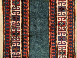 “Green calm below, blue quietness above.” John Greenleaf Whittier, Bordjalu (?) sleeping rug, Caucasus, 19th century, intact condition, full, meaty pile all over.  A calmy green-turquise field sorrounded by rawly drawn  ...