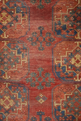 Early Ersari main carpet, around 1850, wool on wool, 270x215 cm. Nice asymmethrical archaic drawing with wonderful colors, greens, blues, reds, yellows... great scaling with the spaces between the güls, needless to  ...