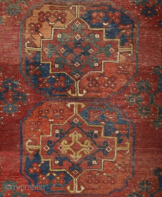 Early Ersari main carpet, around 1850, wool on wool, 270x215 cm. Nice asymmethrical archaic drawing with wonderful colors, greens, blues, reds, yellows... great scaling with the spaces between the güls, needless to  ...
