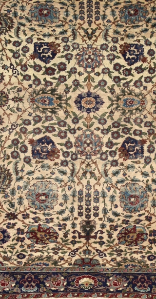 Kayseri "Manchester" rug, wool on cotton, very fine knotting with soft, silky touch. Very characteristic "Shah abbas" field design The cream-ivory ground makes the movement of the leaves and flowers dynamic and  ...
