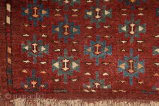 Yomud "Dyrnak" main carpet, 310x170 cm, 19th cent., fantastic colors, different blues , greens, yellows.... unusual elem, opened, bold and graphic drawing, well balanced, spacious field, very fine weave, some unfolded part  ...