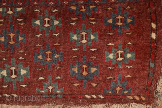 Yomud "Dyrnak" main carpet, 310x170 cm, 19th cent., fantastic colors, different blues , greens, yellows.... unusual elem, opened, bold and graphic drawing, well balanced, spacious field, very fine weave, some unfolded part  ...