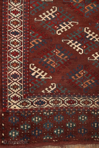 Yomud "Dyrnak" main carpet, 310x170 cm, 19th cent., fantastic colors, different blues , greens, yellows.... unusual elem, opened, bold and graphic drawing, well balanced, spacious field, very fine weave, some unfolded part  ...