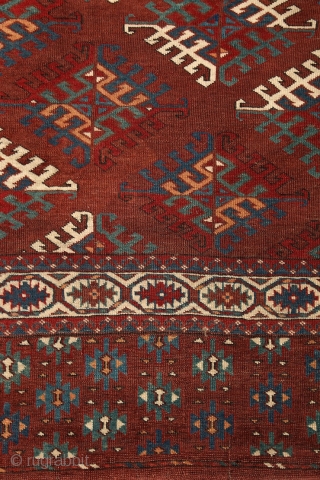 Yomud "Dyrnak" main carpet, 310x170 cm, 19th cent., fantastic colors, different blues , greens, yellows.... unusual elem, opened, bold and graphic drawing, well balanced, spacious field, very fine weave, some unfolded part  ...