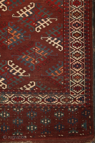 Yomud "Dyrnak" main carpet, 310x170 cm, 19th cent., fantastic colors, different blues , greens, yellows.... unusual elem, opened, bold and graphic drawing, well balanced, spacious field, very fine weave, some unfolded part  ...