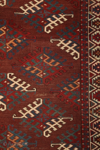 Yomud "Dyrnak" main carpet, 310x170 cm, 19th cent., fantastic colors, different blues , greens, yellows.... unusual elem, opened, bold and graphic drawing, well balanced, spacious field, very fine weave, some unfolded part  ...