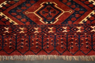 Ersari 'ikat' chuval, 19th century, 150x100 cm, almost intact condition, some small wear in the upper end otherwise full, meaty pile overall. 3 floating cross-medallions in a tremolous, deep field. Clear, archaic  ...