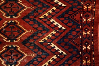 Ersari 'ikat' chuval, 19th century, 150x100 cm, almost intact condition, some small wear in the upper end otherwise full, meaty pile overall. 3 floating cross-medallions in a tremolous, deep field. Clear, archaic  ...