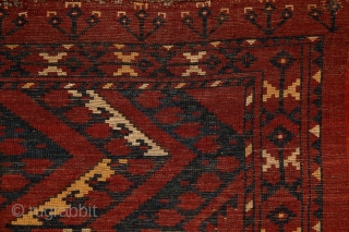 Ersari 'ikat' chuval, 19th century, 150x100 cm, almost intact condition, some small wear in the upper end otherwise full, meaty pile overall. 3 floating cross-medallions in a tremolous, deep field. Clear, archaic  ...