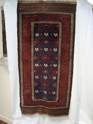 Late 19th century Baluch Mina Khani rug with full pile and kilims, but, with corrosion to browns/black.  Two blues,  aubergine/brown, red, natural white and a couple of yellow flecks in  ...