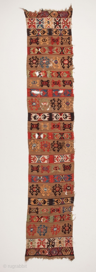 Anatolian kilim fragment circa 19th century, extensive use of camel wool, vibrant natural colours, various losses and damage as apparent in the images, securing done for washing still in place, 366 x  ...